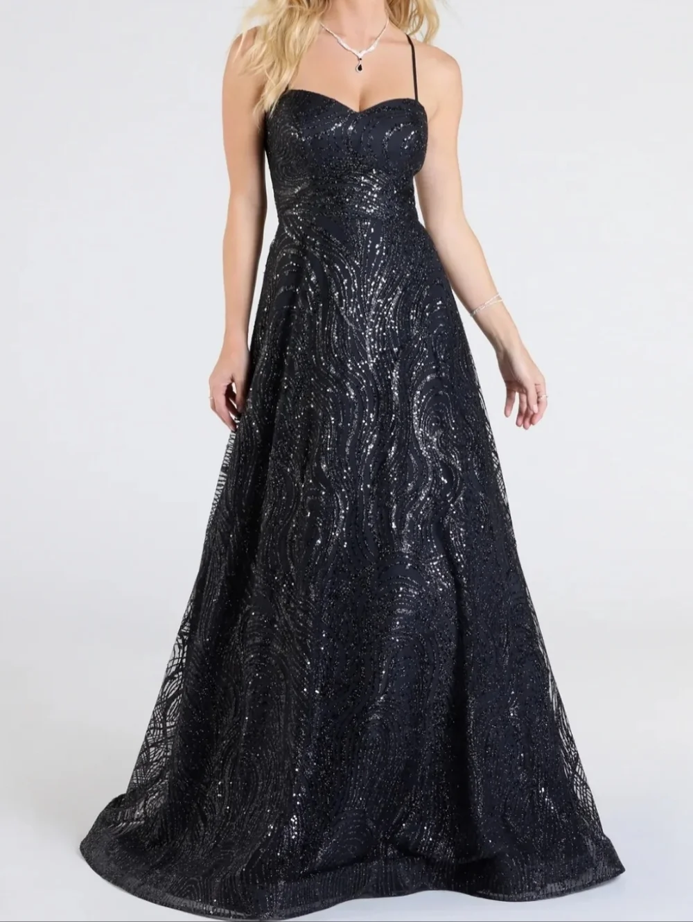 Black Sequined Spaghetti Strap Evening Gown With A Corset Back - Picture 1 of 3